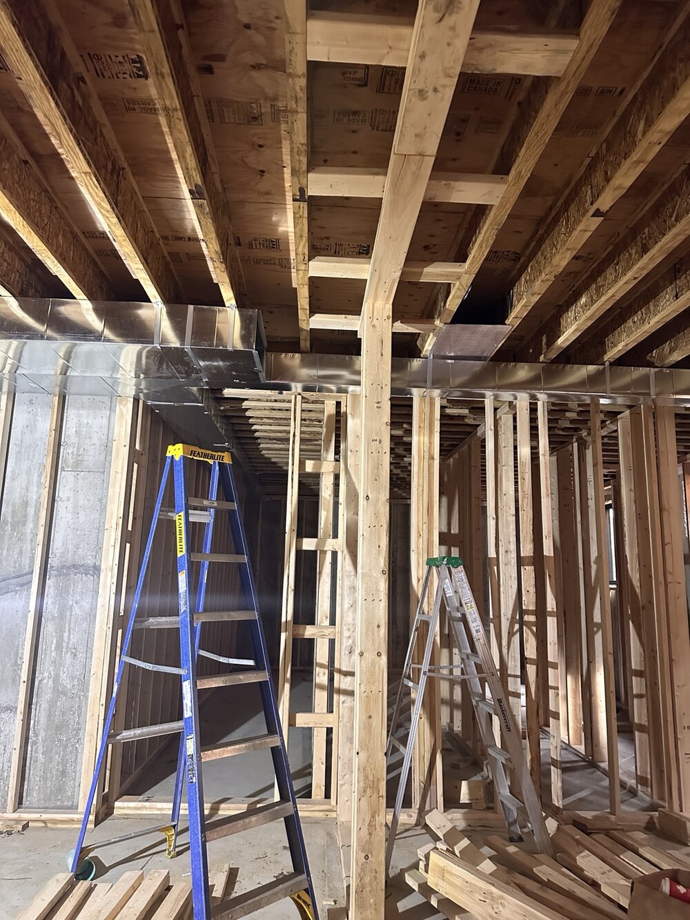 Airmaxx custom sheet-metal ductwork installed throughout a new home during framing